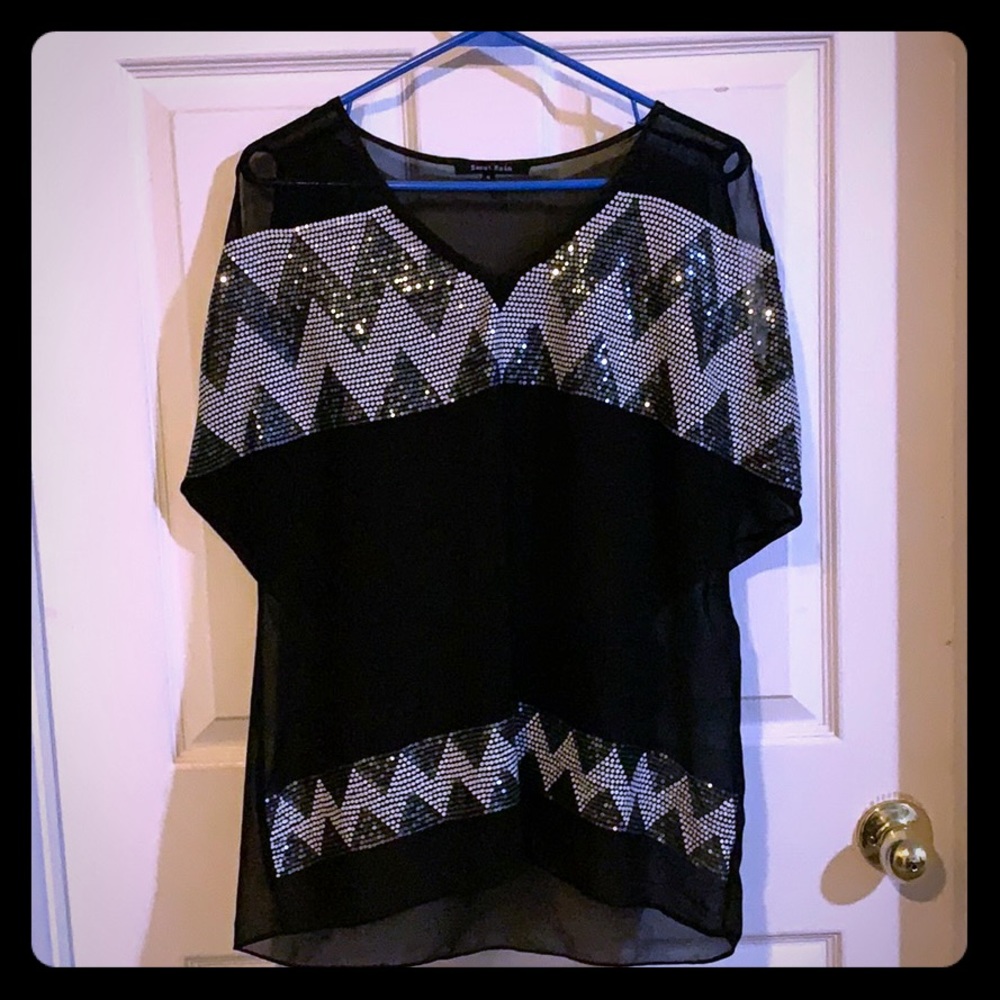 Woman’s black sequin shirt